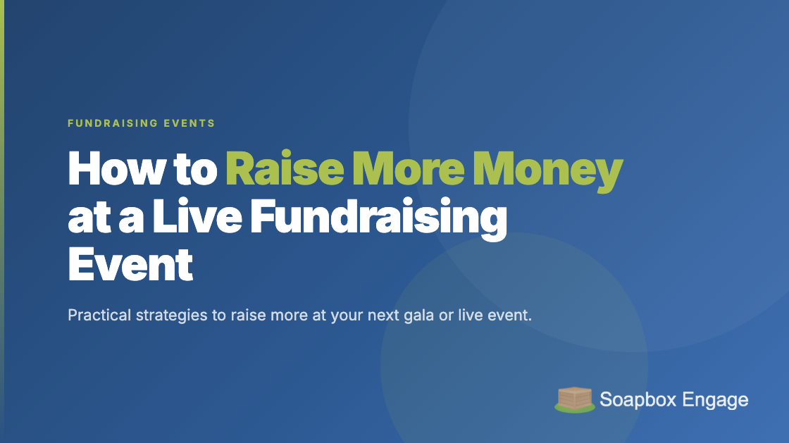 Nonprofit fundraising gala with attendees bidding on mobile phones and a live display showing fundraising progress on screen
